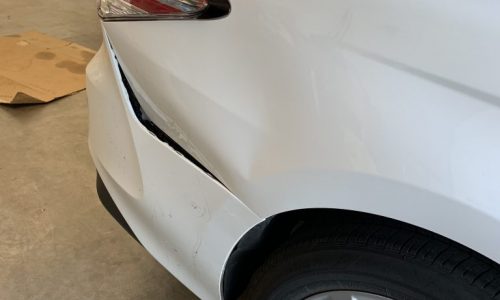 Before Tint Garage - Paintless Dent Repair