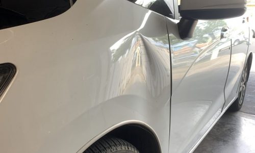 Before Tint Garage - Paintless Dent Repair